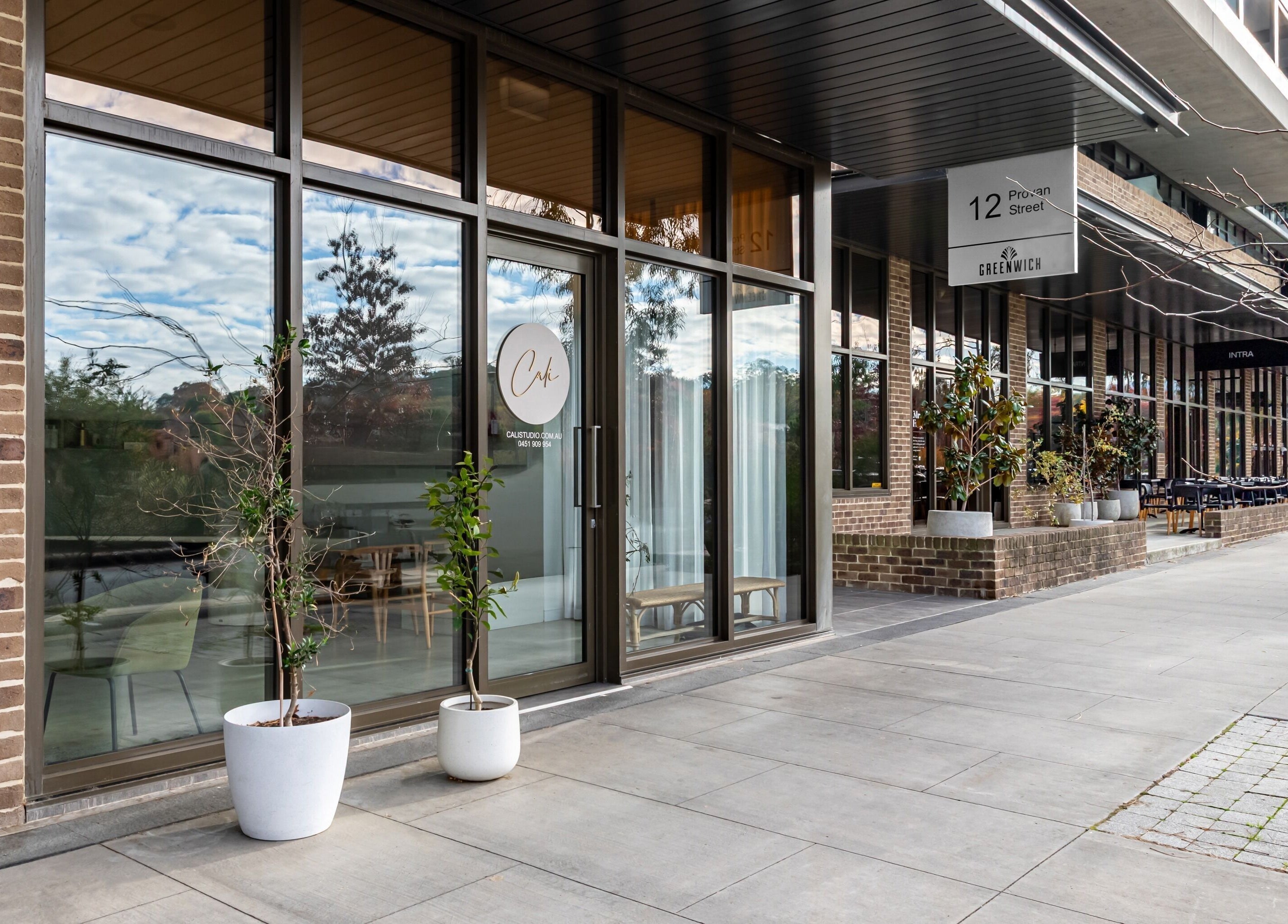 Cali Studio entrance with glass facade in Campbell, Australian Capital Territory, AU.