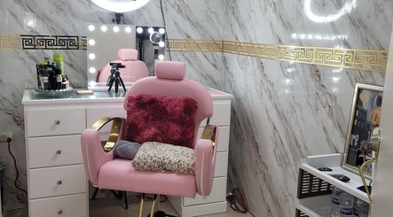 Luxurious beauty station at InHaleMickii, Portmore, St. Catherine Parish, JM with pink chair and vanity.