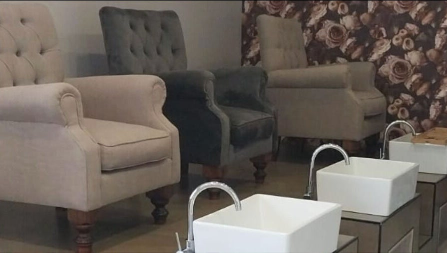 Elegant pedicure chairs at Glow Align in Pretoria, Gauteng, ZA, showcasing comfort and style with floral decor.