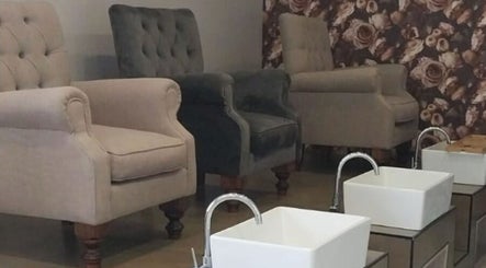 Elegant pedicure chairs at Glow Align in Pretoria, Gauteng, ZA, showcasing comfort and style with floral decor.