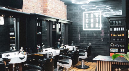 Modern barber chairs and products at The Cut LDN, London, England, GB.