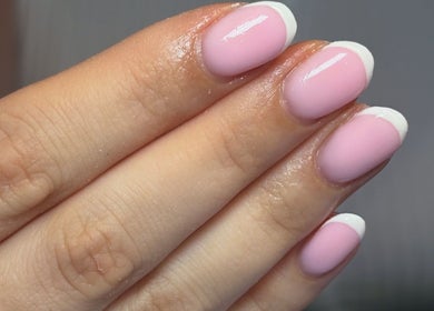 French manicure at Macie Jones Studios, Aberdare, Wales, GB, showcasing elegant pink and white nails.