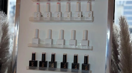 Nail polish selection at Macie Jones Studios, Aberdare, Wales, GB, highlighting premium beauty products.