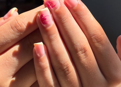 Elegant floral nail art at Macie Jones Studios, Aberdare, Wales, GB, showcasing fine detail.