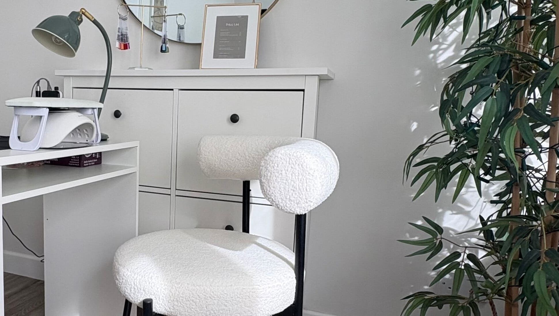 Nail station at Nails by Kirsty, Balbriggan, County Dublin, IE, featuring a modern chair and minimalist decor.