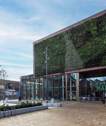 Exterior of Chester Market featuring a green wall, near Chester Dog Groomers, Chester, England, GB.