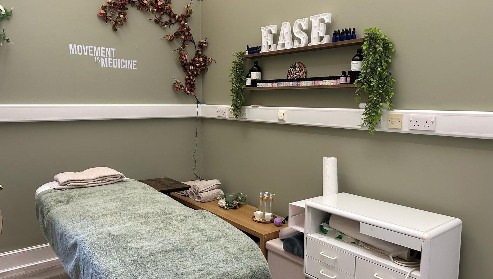 Relaxing therapy room at Healthysole Reflexology, Burntisland, Scotland, GB with soft lighting and calming decor.