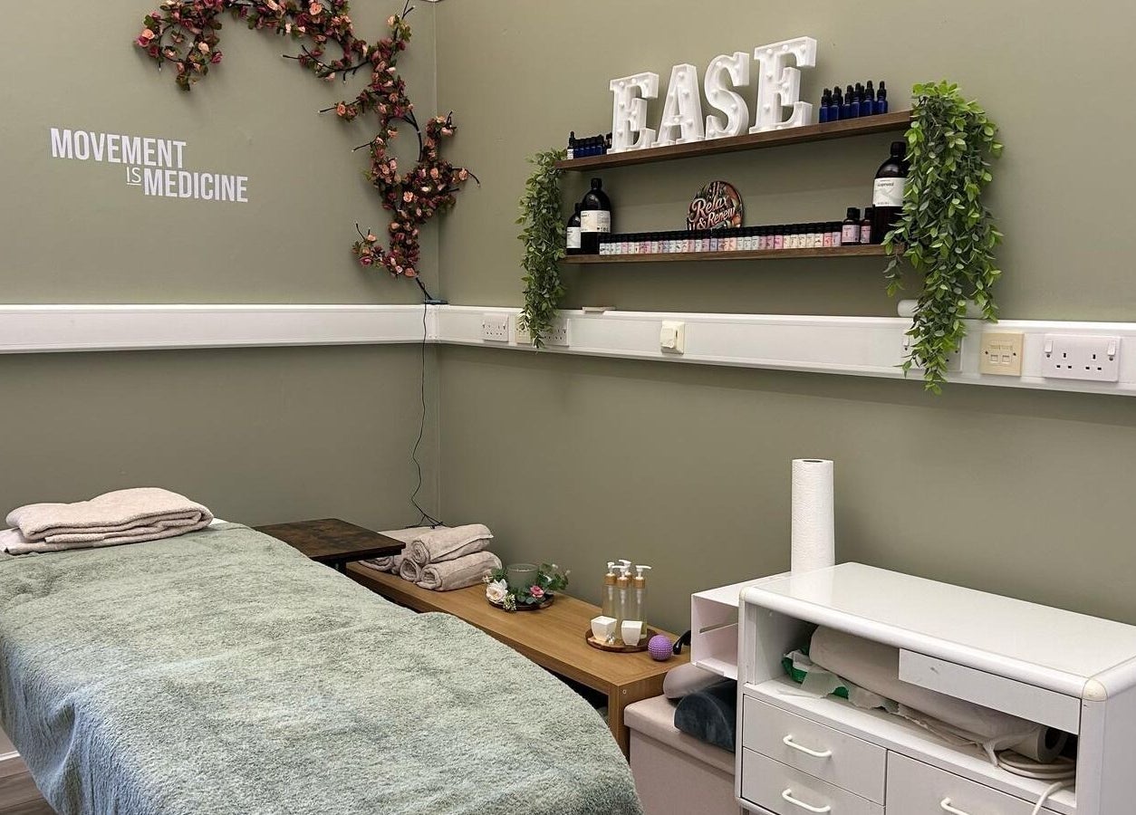 Relaxing therapy room at Healthysole Reflexology, Burntisland, Scotland, GB with soft lighting and calming decor.