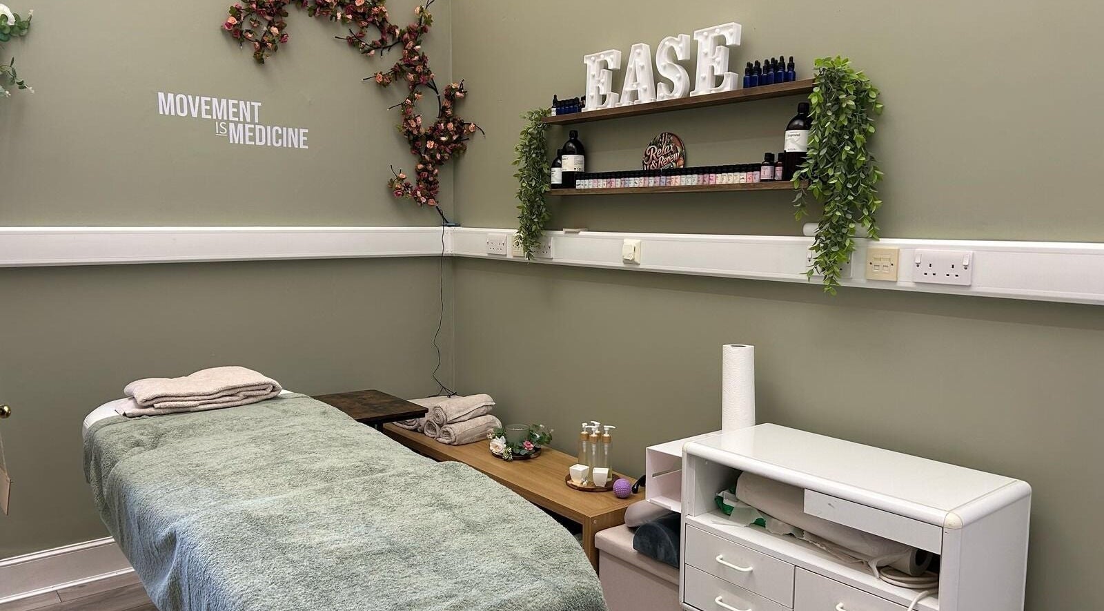 Relaxing therapy room at Healthysole Reflexology, Burntisland, Scotland, GB with soft lighting and calming decor.