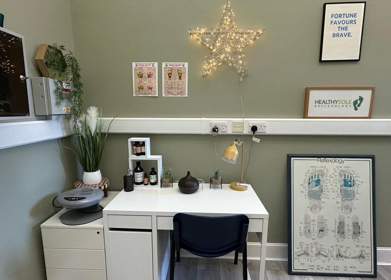 Cozy workspace at Healthysole Reflexology, Burntisland, Scotland, GB, featuring a desk with wellness decor.