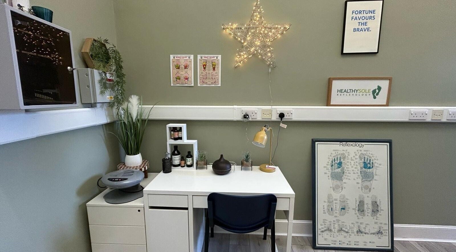 Cozy workspace at Healthysole Reflexology, Burntisland, Scotland, GB, featuring a desk with wellness decor.