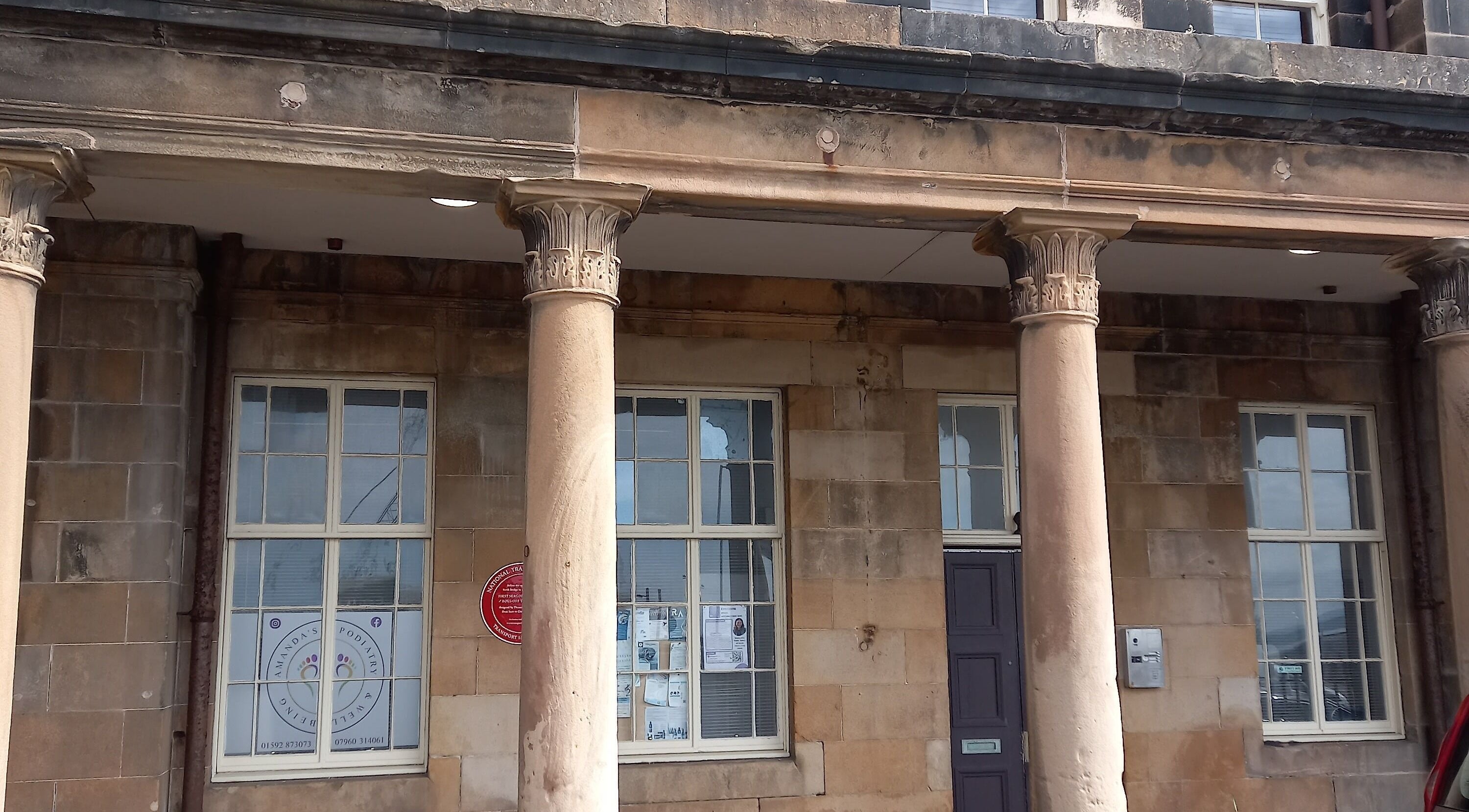 Front view of Healthysole Reflexology in Burntisland, Scotland, GB, showcasing classic stone columns.