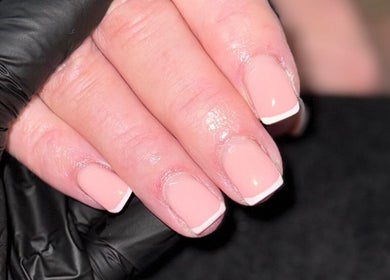 Stylish French manicure at Byellaofm, Birmingham, England, GB, showcasing elegant nail art.