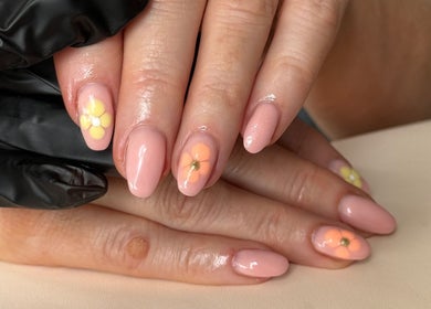 Detailed floral nail art at Byellaofm in Birmingham, England, GB, showcasing professional beauty services.