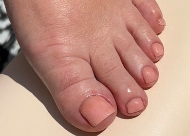 Close-up of polished toenails, professionally done at Byellaofm, Birmingham, England, GB.