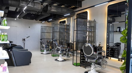 Modern barber chairs at Ace Lebanese Barber Shop in Al Khobar, Eastern Province, SA.