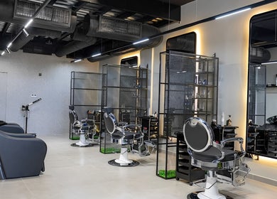 Modern barber chairs and sleek interior at Ace Lebanese Barber Shop, Al Khobar, Eastern Province, SA.