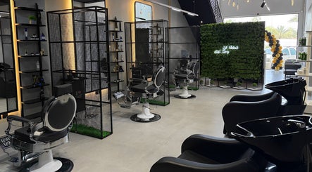 Interior of Ace Lebanese Barber Shop in Al Khobar, Eastern Province, SA featuring sleek barber chairs and decor.