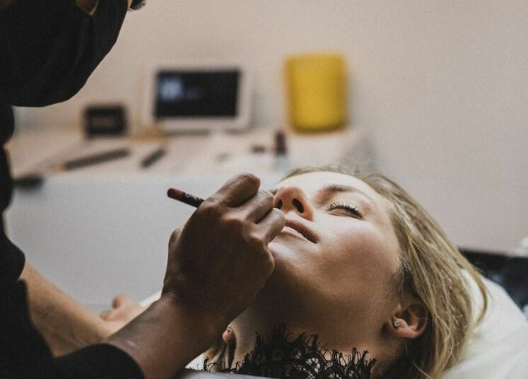 Makeup artist perfecting a look at Flutter Beauty Studio, Melbourne, Victoria, AU.