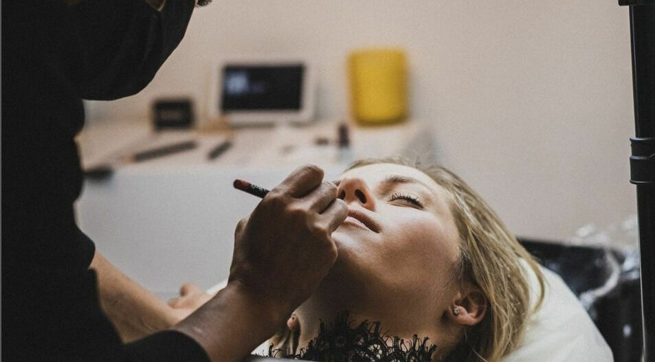Makeup artist perfecting a look at Flutter Beauty Studio, Melbourne, Victoria, AU.