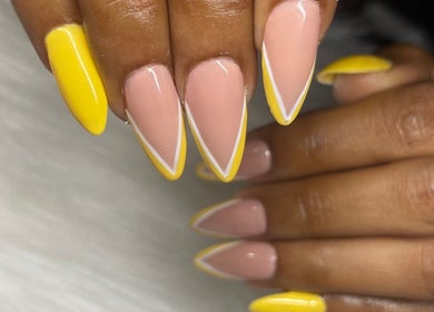 Stylish pink and yellow stiletto nails from TipTastic Nails in Plymouth, Tobago, TT.