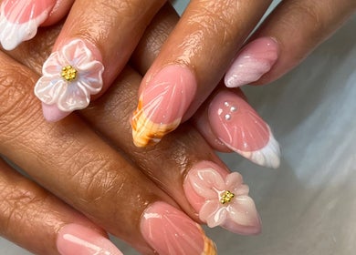 Elegant floral nail art at PRESH’S NAIL BAR, Pretoria, Gauteng, ZA. Pink nails with 3D flowers and designs.