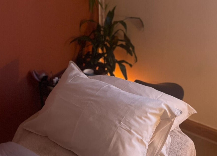 Cozy massage bed at Rooted in Rest, Auchterarder, Scotland, GB, inviting relaxation.