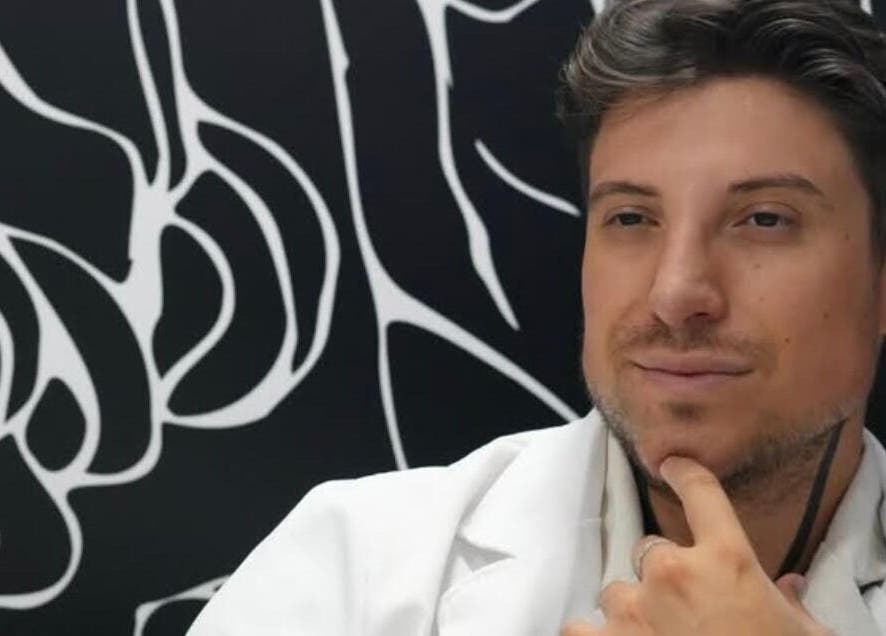 Stylish individual in chic setting at Dr. Adonis Eclat S.R.L., Bucharest, Bucharest, RO.