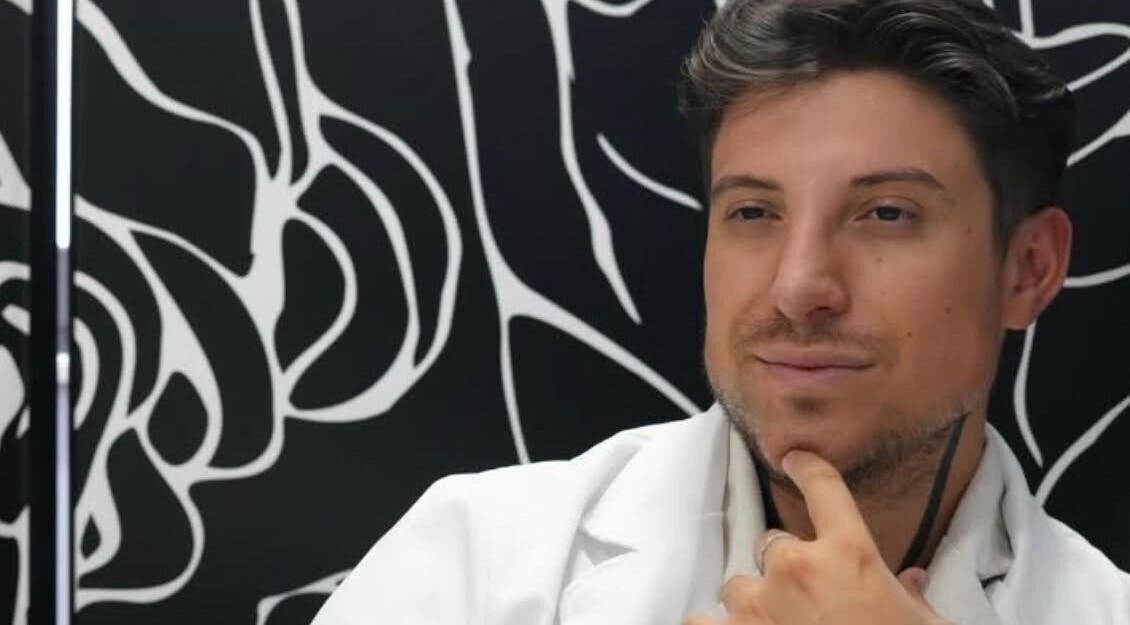 Stylish individual in chic setting at Dr. Adonis Eclat S.R.L., Bucharest, Bucharest, RO.