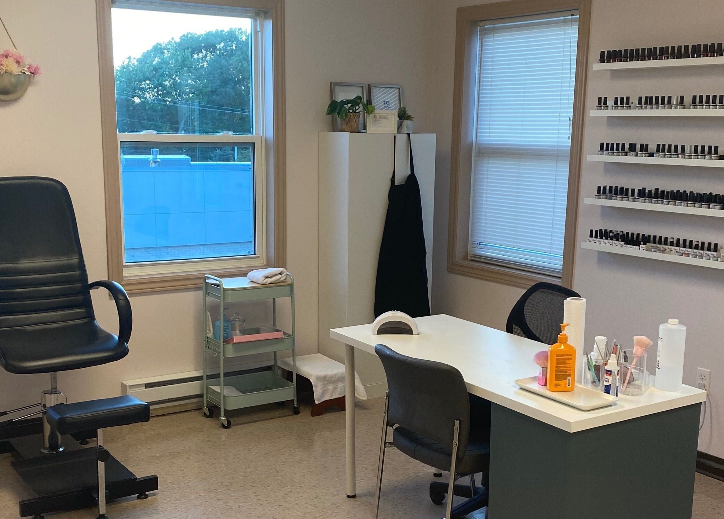 Gel Envy - Jasmin Shears' modern nail care setup in Lower Sackville, Nova Scotia, CA, showcasing a chic interior.