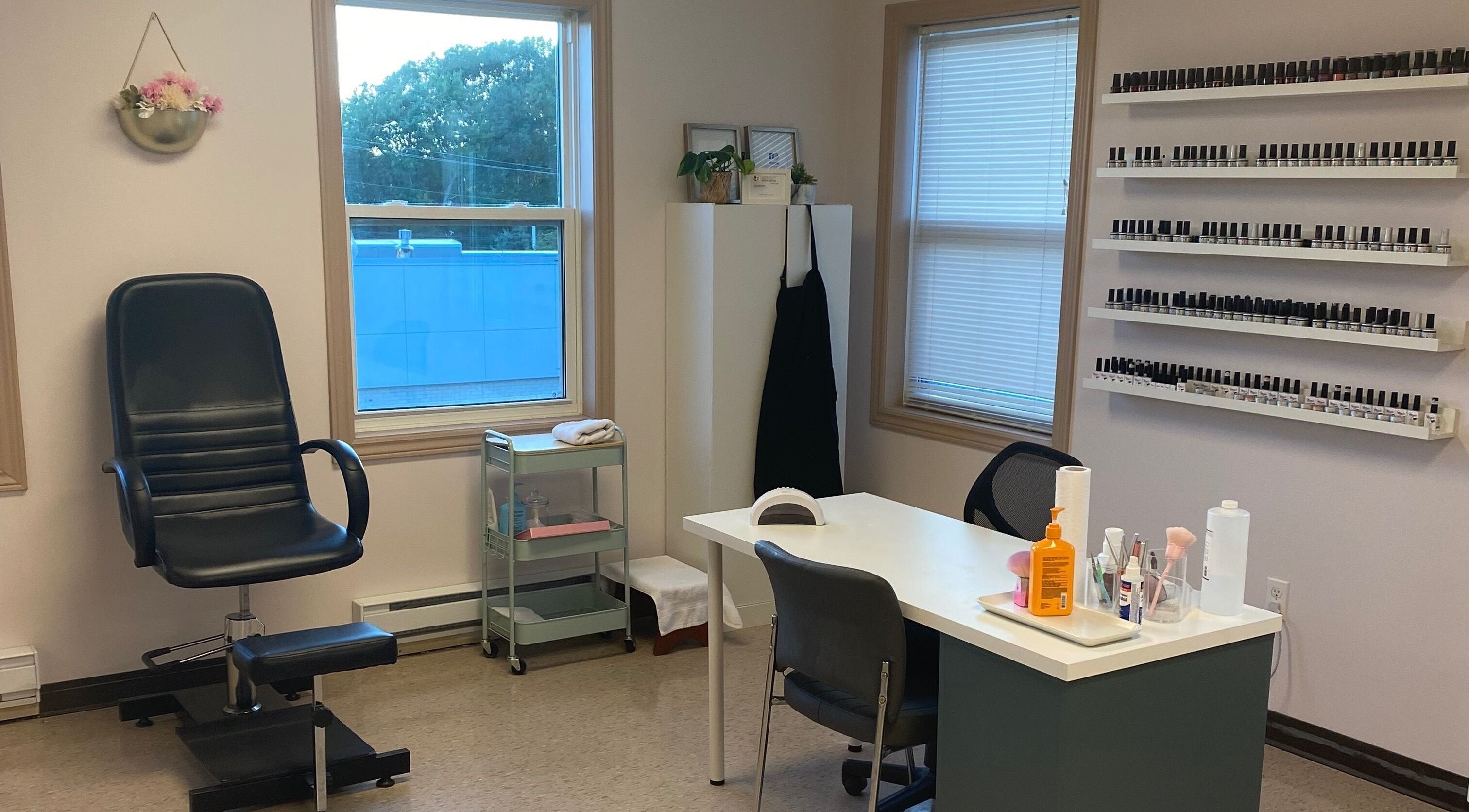 Gel Envy - Jasmin Shears' modern nail care setup in Lower Sackville, Nova Scotia, CA, showcasing a chic interior.