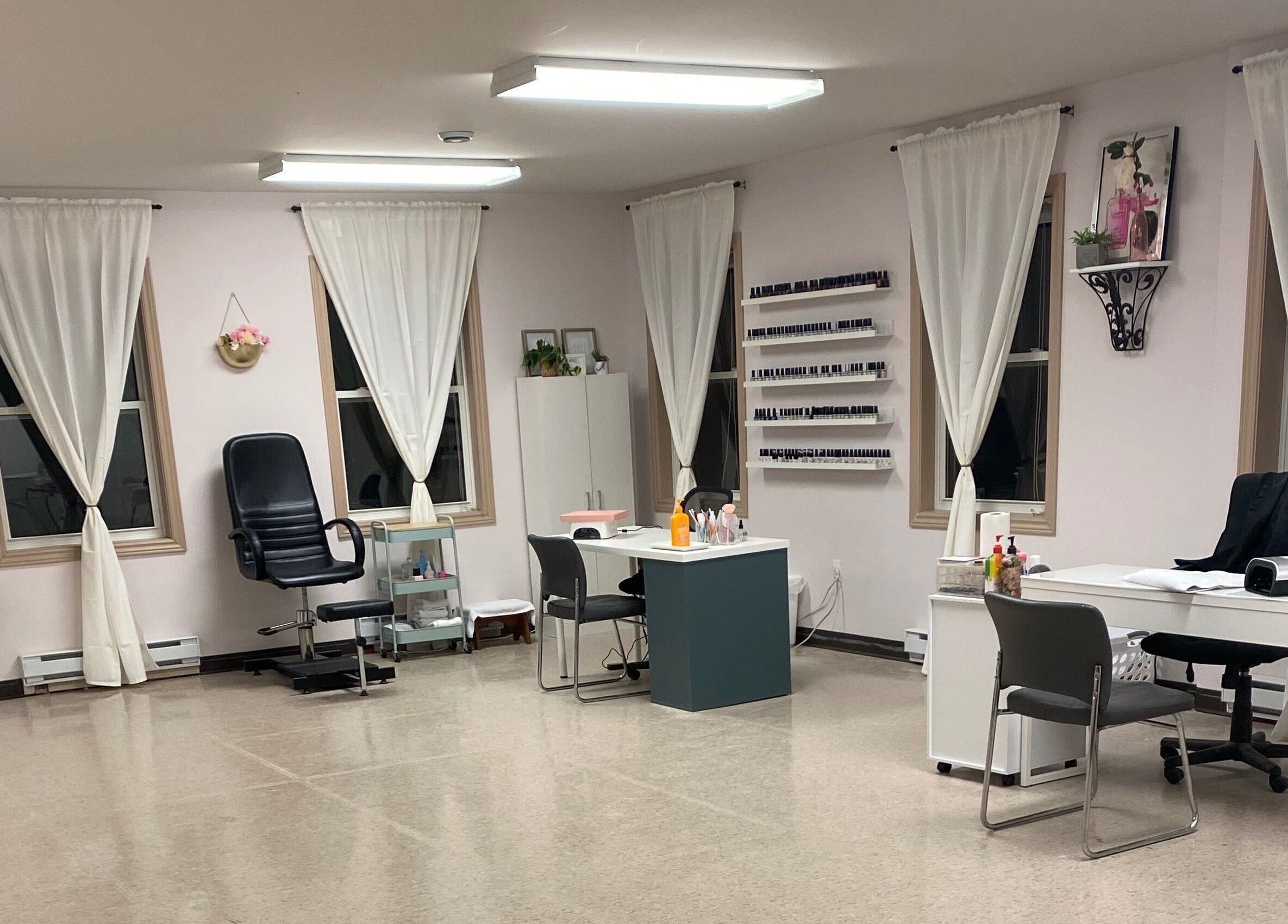 Bright, airy interior of Gel Envy - Jasmin Shears in Lower Sackville, Nova Scotia, CA with modern nail stations.