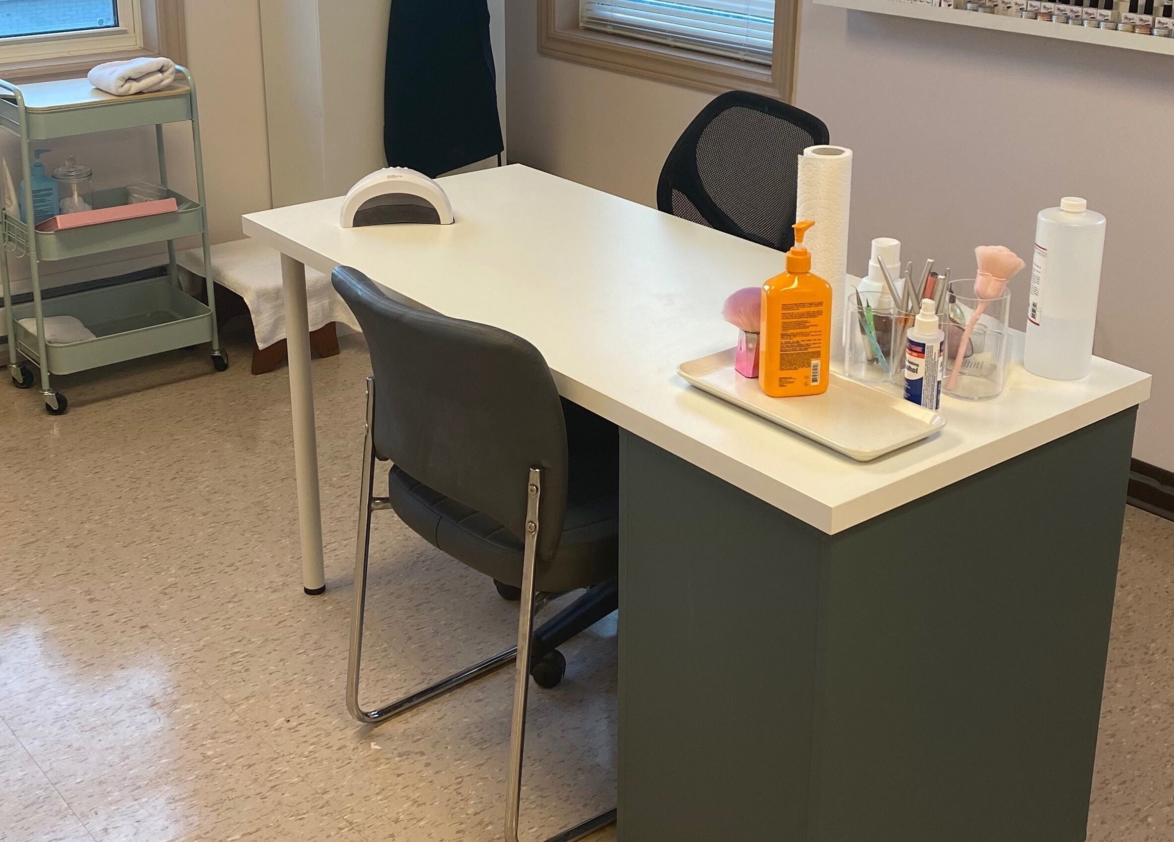Cozy nail treatment setup at Gel Envy - Jasmin Shears, Lower Sackville, Nova Scotia, CA with tools and supplies.