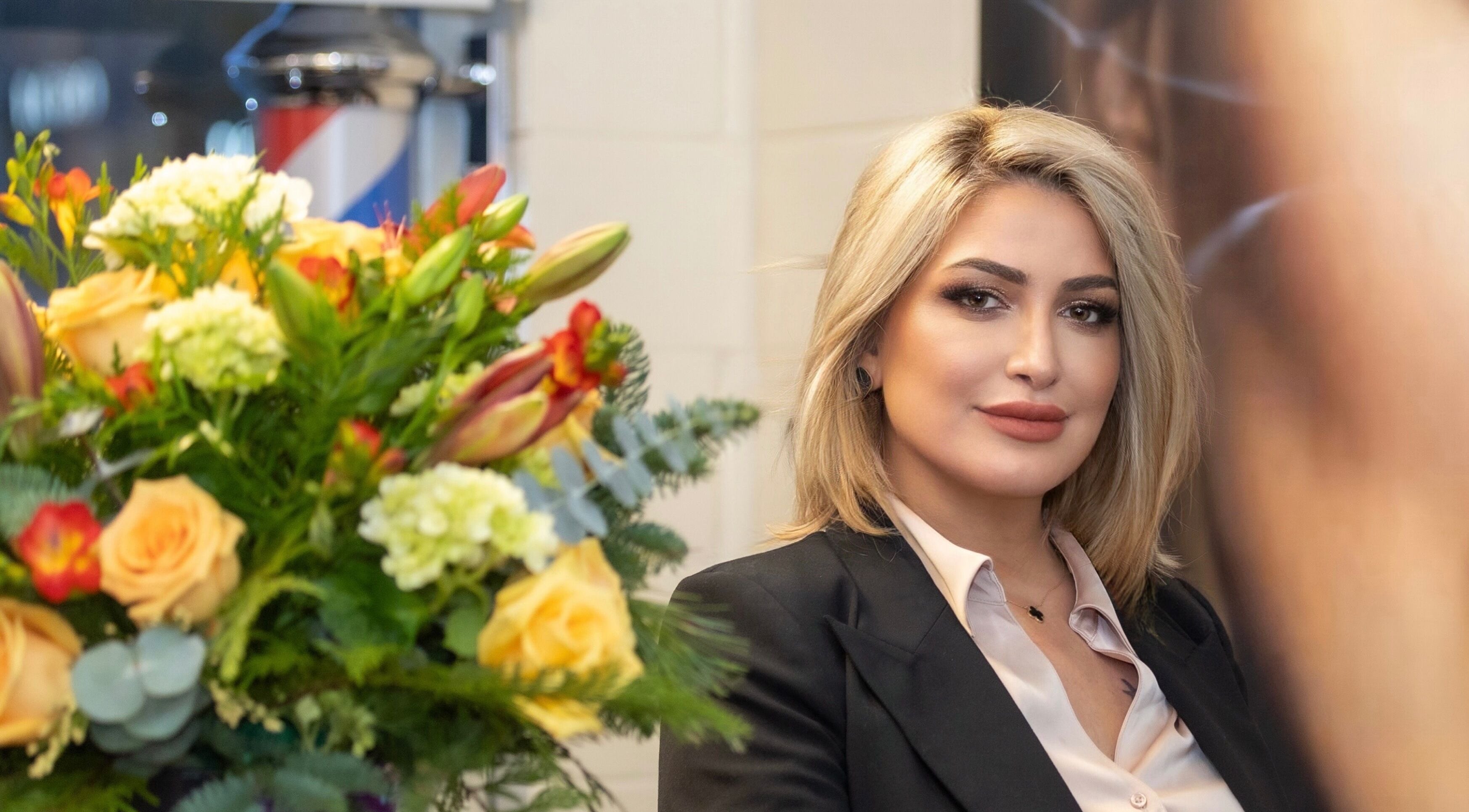 Professional welcome at Avante Salon & Spa, Hamilton, Ontario, CA with vibrant floral display.