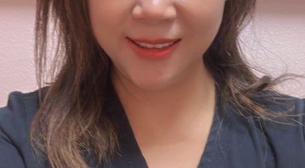 Warm smile at Apple Maples Today Thai massage&Beauty, Las Vegas, Nevada, US, inviting joy and relaxation.