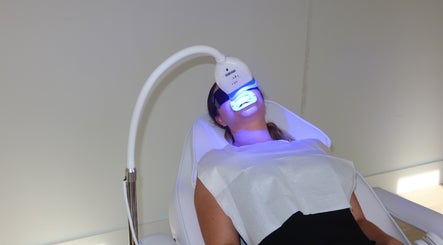 Client receiving teeth whitening at Blanco Cosmetic Teeth Whitening in Houston, Texas, US.