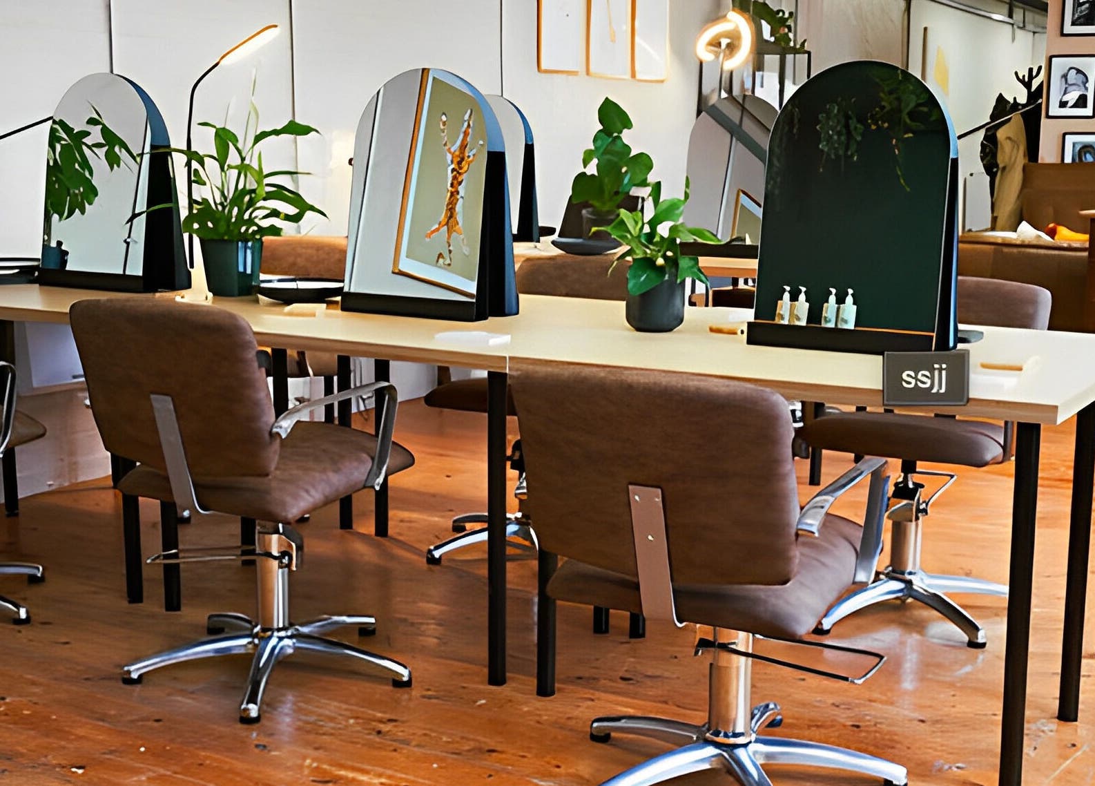 Sophia Colorist at This Is Who We Are Collective, Leeds, England, GB. Stylish salon interior with mirrors and plants.