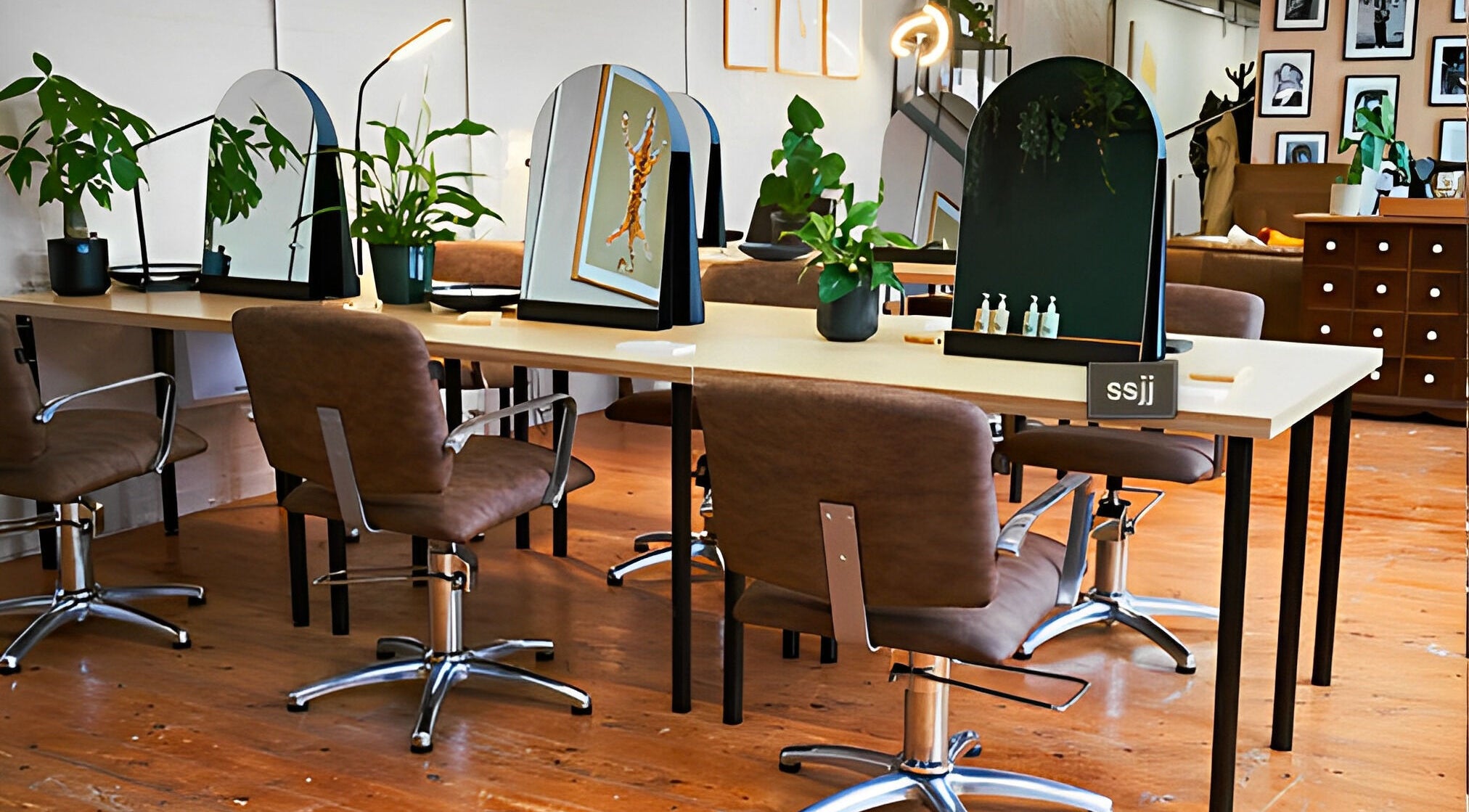 Sophia Colorist at This Is Who We Are Collective, Leeds, England, GB. Stylish salon interior with mirrors and plants.