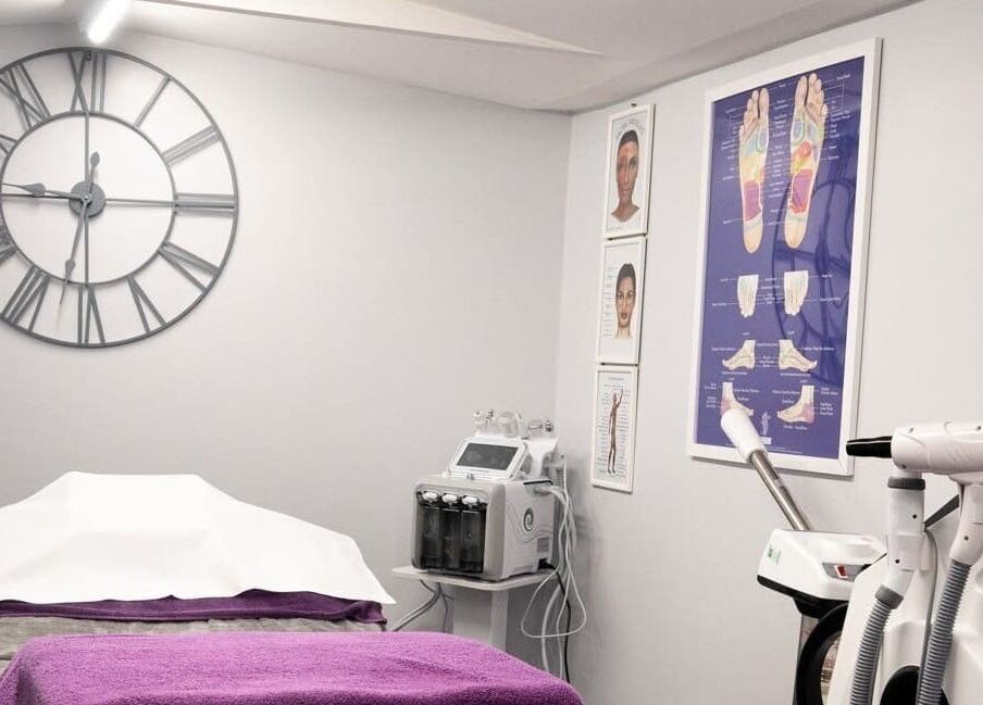 Relaxing treatment room at Reflexions, Hockley, England, GB with equipment and calming decor.