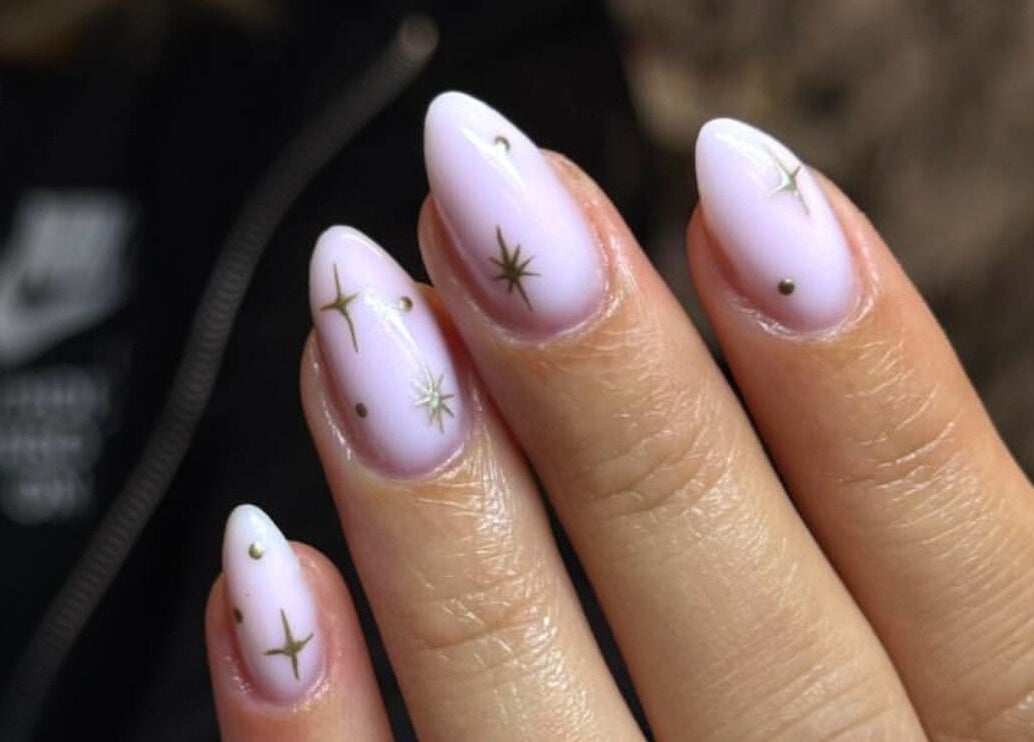 Elegant star-themed nail art by By Bethany in Newport, Wales, GB. Perfect for a chic, stylish look.