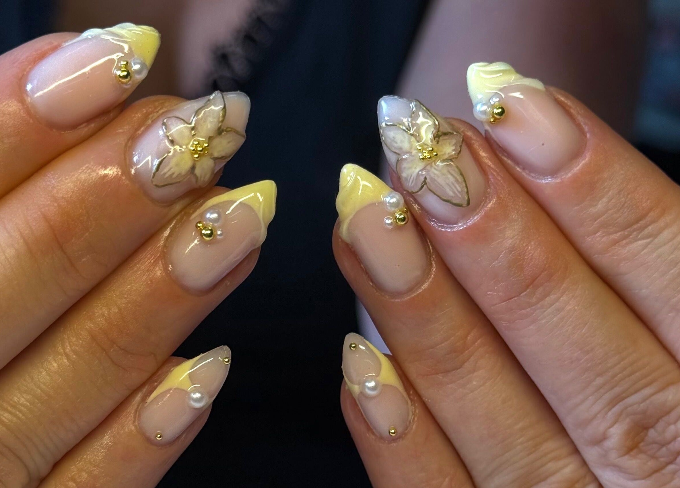 Intricate floral nail art at By Bethany in Newport, Wales, GB showcasing detailed craftsmanship and elegance.