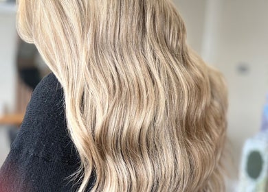 Blonde wavy hair styled at Sharon O'Brien At Eclipse Hair and Beauty, Euxton, England, GB.