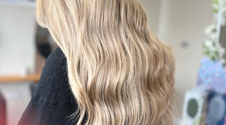 Blonde wavy hair styled at Sharon O'Brien At Eclipse Hair and Beauty, Euxton, England, GB.