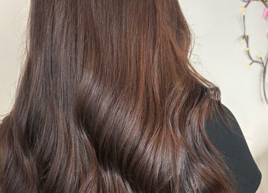 Elegant brunette hair styled at Sharon O'Brien At Eclipse Hair and Beauty, Euxton, England, GB.
