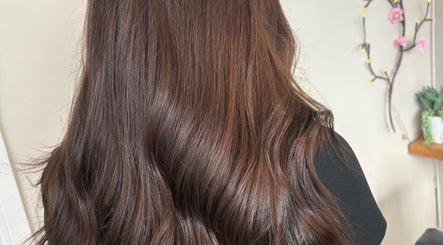 Elegant brunette hair styled at Sharon O'Brien At Eclipse Hair and Beauty, Euxton, England, GB.