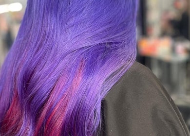 Bright violet and pink hair styled at Sharon O'Brien At Eclipse Hair and Beauty in Euxton, England, GB salon.