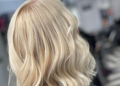 Blonde wavy hairstyle at Sharon O'Brien At Eclipse Hair and Beauty, Euxton, England, GB.