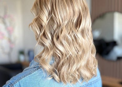 Blonde wavy hairstyle at Sharon O'Brien At Eclipse Hair and Beauty in Euxton, England, GB.