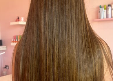 Smooth, glossy hair results at Hair by Susie Hancock, Ferndown, England, GB. Perfected with professional care.
