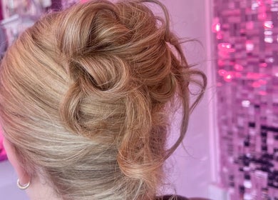Intricate updo hairstyle at Hair by Susie Hancock in Ferndown, England, GB.